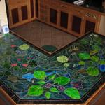 Custom cut and painted tile used for the top of our bar, in the house we built.