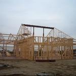 Building with rid beam in center to carry I Joist for cathedral ceiling.