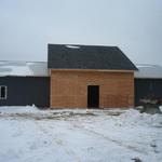 Plywood on the center of the building. Ready to cut out for the windows and to install them. 2/28/13