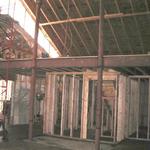 View entering the main building. Loft subfloor down, steps and interior wall framing. 3/11/13