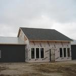 Center of building wrapped in house wrap for protection. Windows installed!!! 3/16/13